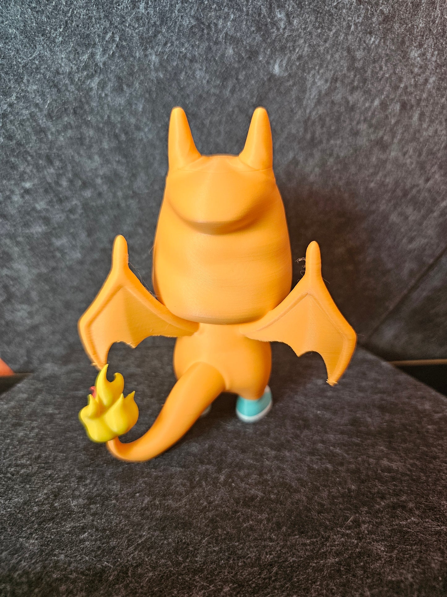 Charmander in Charizard Onesie