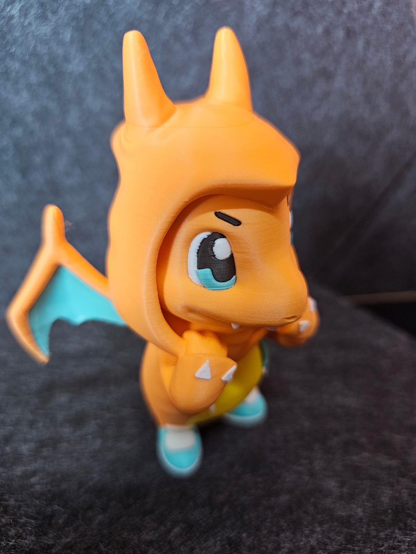 Charmander in Charizard Onesie